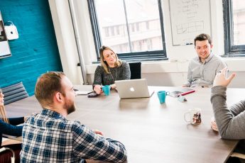 impression digital marketing team meeting